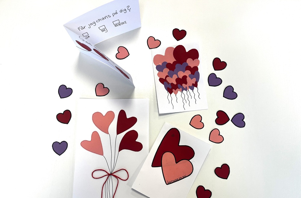 Fyra Alla hjärtans dag-kort med hjärtmotiv och texten Får jag chans på dig